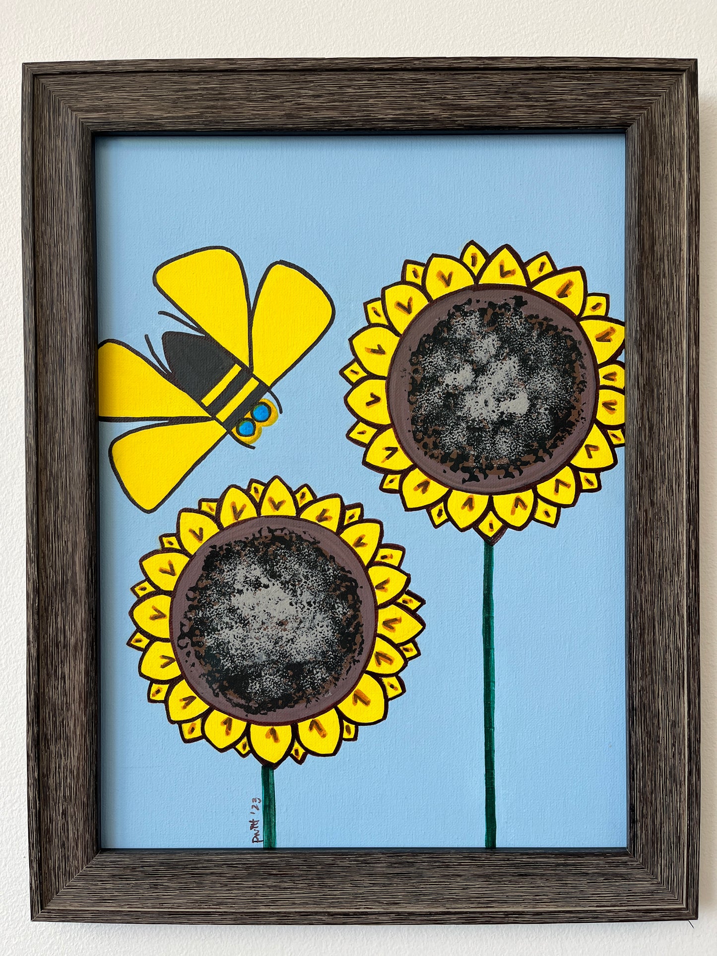 Framed Painting of Yellow Bee with Two Sunflower Stems