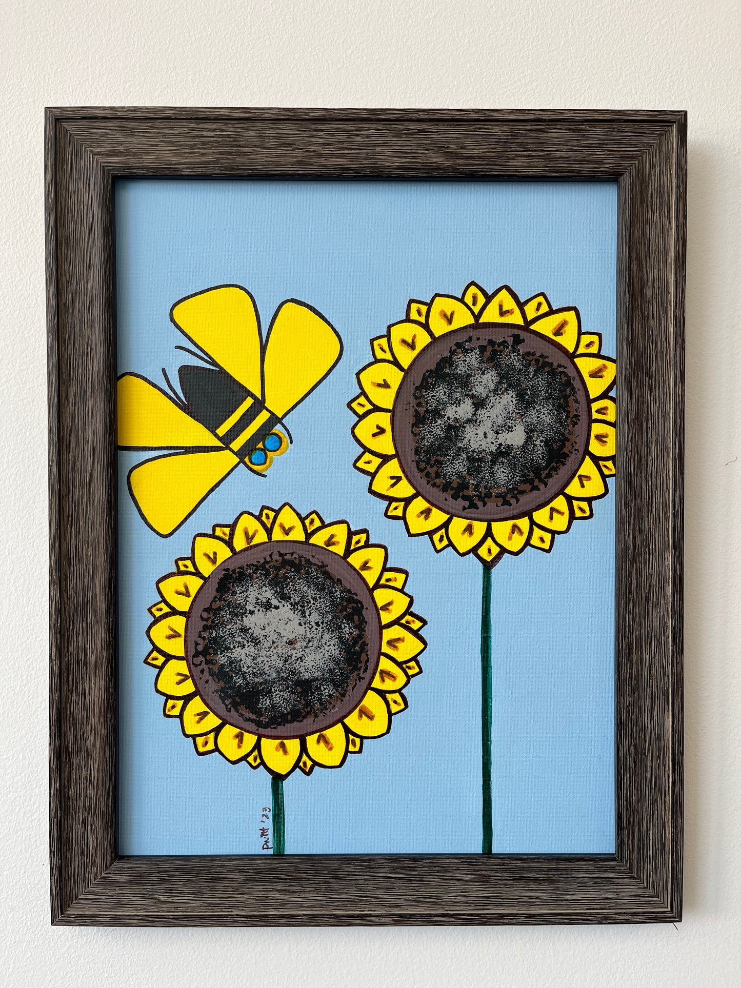 Framed Painting of Yellow Bee with Two Sunflower Stems