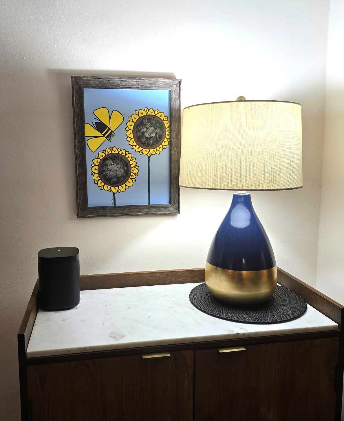 Framed Painting of Yellow Bee with Two Sunflower Stems